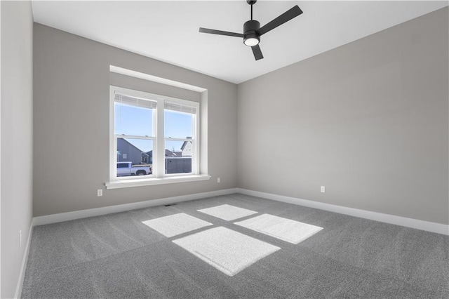 17178 S Heatherwood St, Olathe, KS 66062 - empty room featuring carpet flooring, a ceiling fan, and baseboards