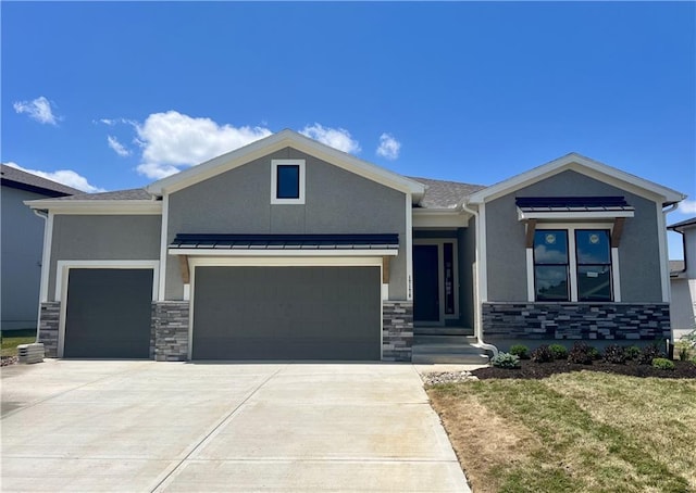17178 S Heatherwood St, Olathe, KS 66062 - view of front of house with a garage, stone siding, and stucco siding