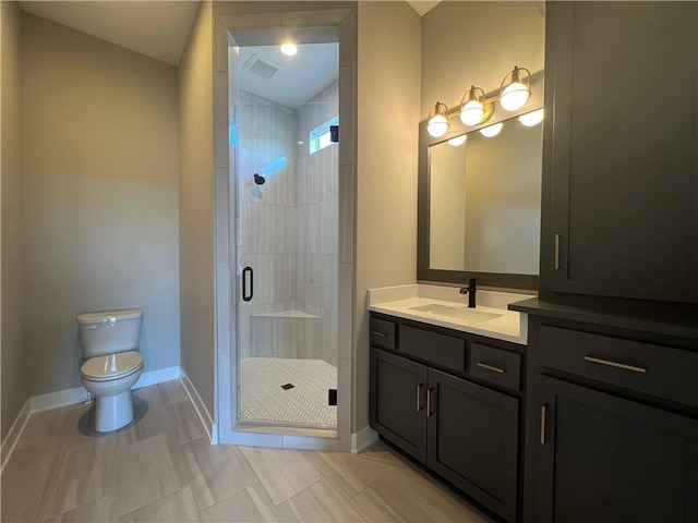 17178 S Heatherwood St, Olathe, KS 66062 - bathroom featuring vanity, a shower stall, and tile patterned flooring