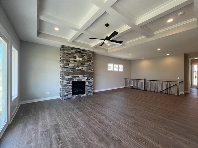 17178 S Heatherwood St, Olathe, KS 66062 - unfurnished living room featuring ceiling fan, beam ceiling, dark wood finished floors, coffered ceiling, and a fireplace