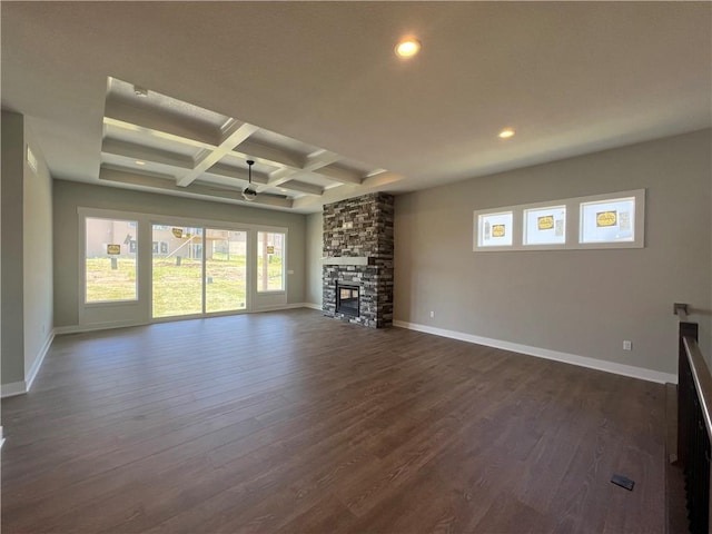 17178 S Heatherwood St, Olathe, KS 66062 - unfurnished living room with a stone fireplace, recessed lighting, dark wood-style flooring, beamed ceiling, and coffered ceiling