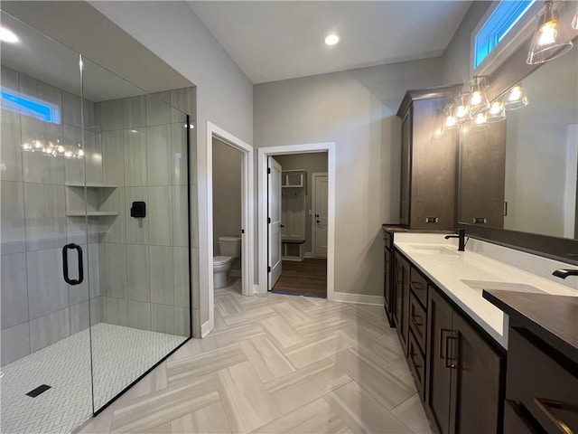 17178 S Heatherwood St, Olathe, KS 66062 - full bath with double vanity, a shower stall, and recessed lighting