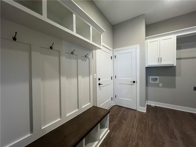 17178 S Heatherwood St, Olathe, KS 66062 - mudroom with dark wood-style flooring and baseboards