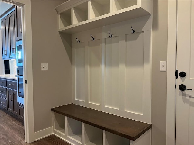 17178 S Heatherwood St, Olathe, KS 66062 - mudroom with baseboards and dark wood-style floors