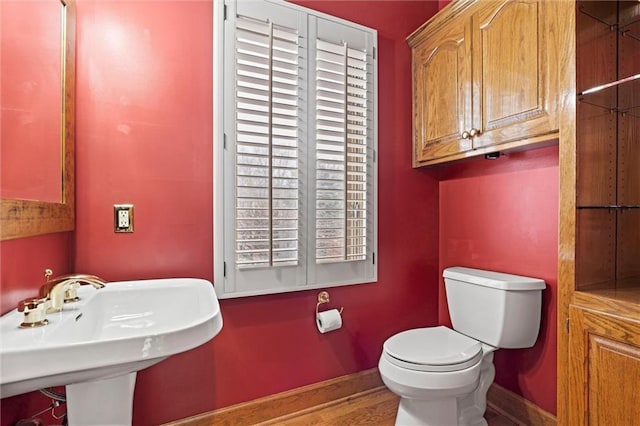 bathroom with toilet and sink