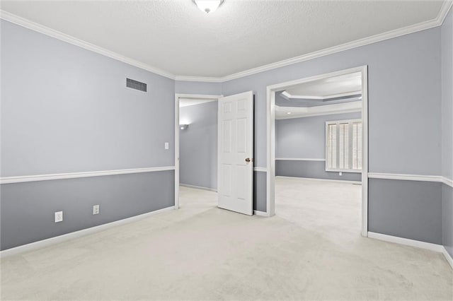 interior space with light carpet, crown molding, and a textured ceiling