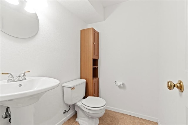 bathroom featuring toilet