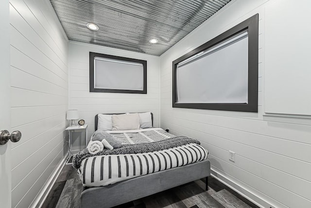 bedroom featuring dark wood-type flooring