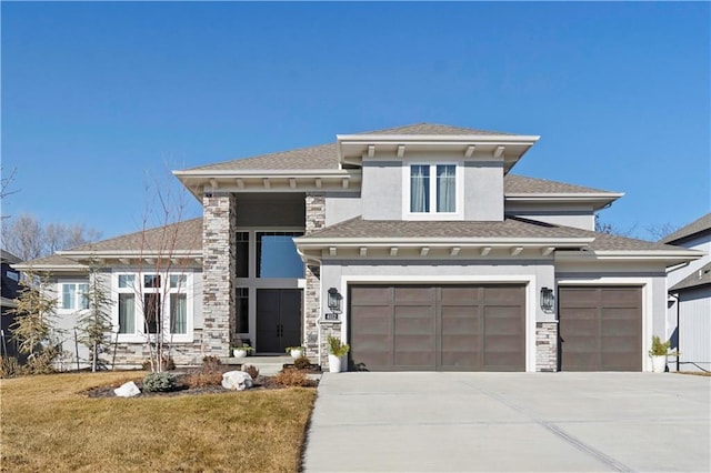 prairie-style home with stone siding, driveway, and stucco siding