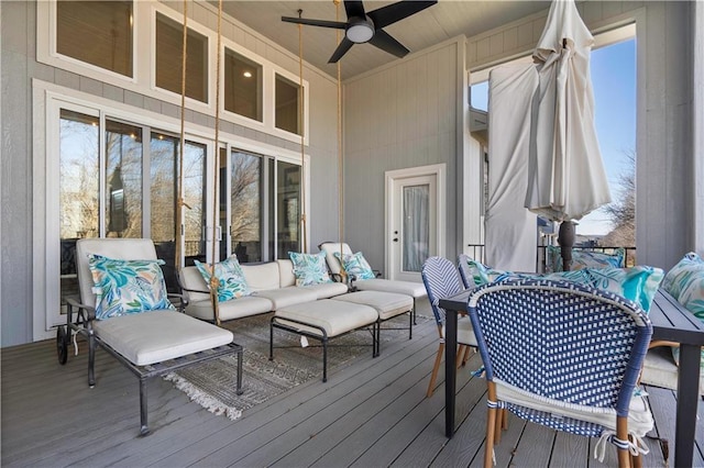 deck with ceiling fan and outdoor lounge area