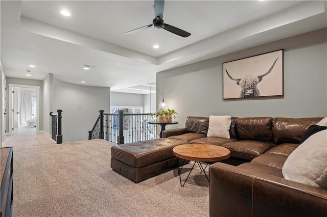 living room with recessed lighting, light carpet, and ceiling fan