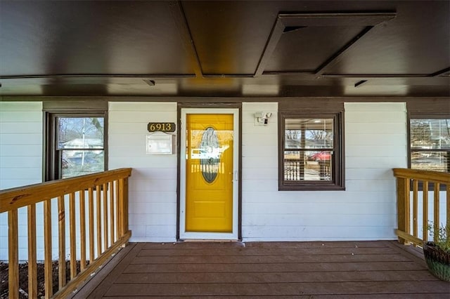 doorway to property with a porch