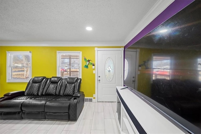 foyer featuring a textured ceiling