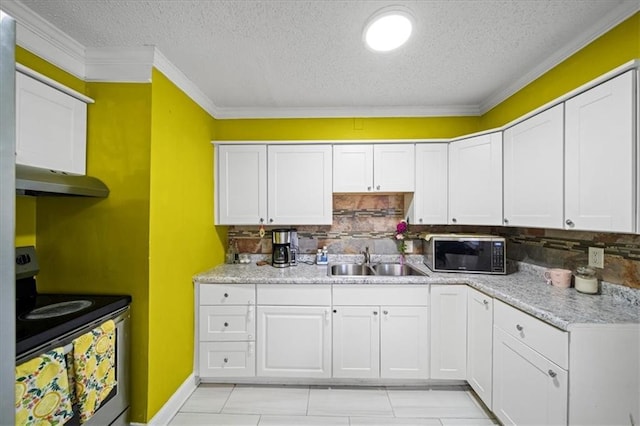 kitchen with white cabinetry, stainless steel appliances, crown molding, and sink