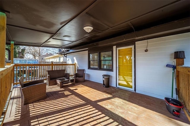 deck with an outdoor hangout area