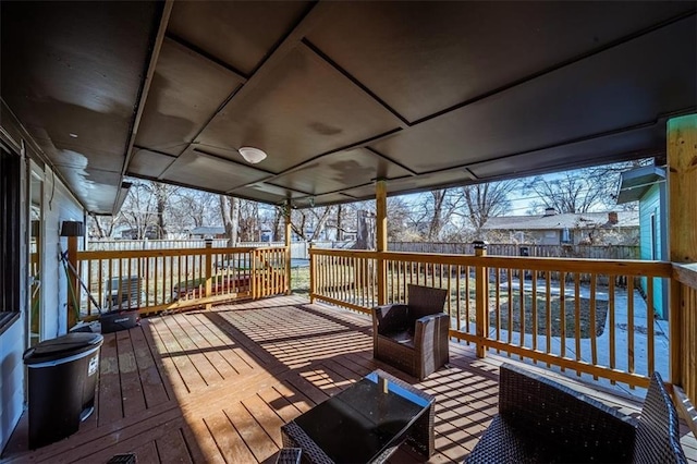 snow covered deck featuring an outdoor hangout area