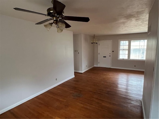 spare room featuring dark hardwood / wood-style floors