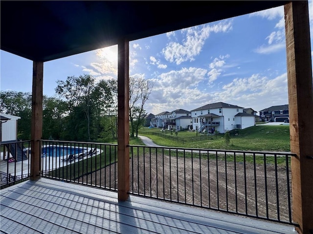 10332 N Potter Ave, Kansas City, MO 64157 - wooden deck featuring a residential view and a yard