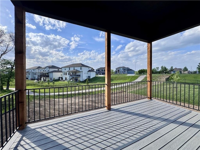 10332 N Potter Ave, Kansas City, MO 64157 - wooden deck with a residential view and a lawn