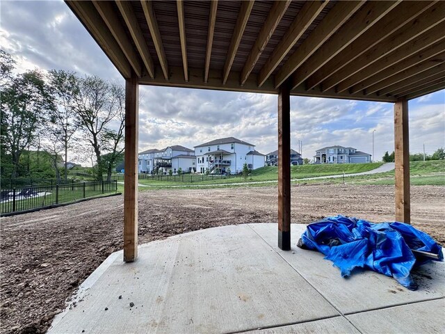 10332 N Potter Ave, Kansas City, MO 64157 - view of patio / terrace featuring a residential view and fence