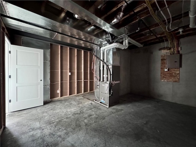 10332 N Potter Ave, Kansas City, MO 64157 - unfinished basement with electric panel and heating unit