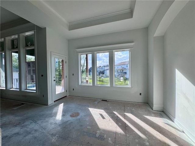 10332 N Potter Ave, Kansas City, MO 64157 - empty room featuring a tray ceiling and ornamental molding