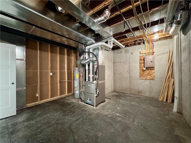 10332 N Potter Ave, Kansas City, MO 64157 - unfinished basement with heating unit, electric water heater, and electric panel
