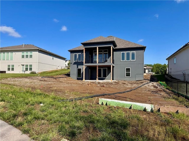 10332 N Potter Ave, Kansas City, MO 64157 - rear view of property featuring a balcony and roof with shingles