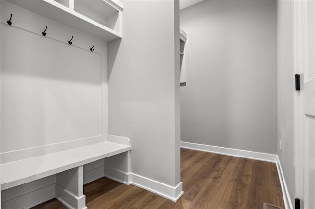 mudroom featuring dark wood-type flooring