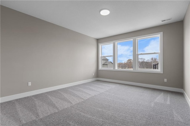 view of carpeted spare room