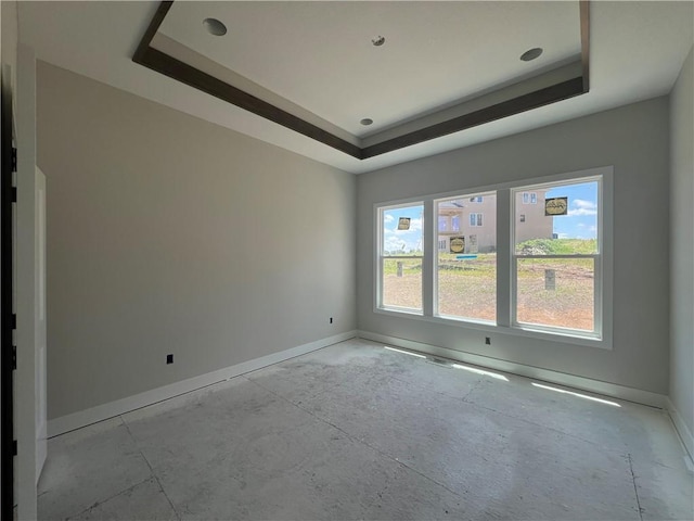 17154 S Heatherwood St, Olathe, KS 66062 - empty room with a tray ceiling and baseboards