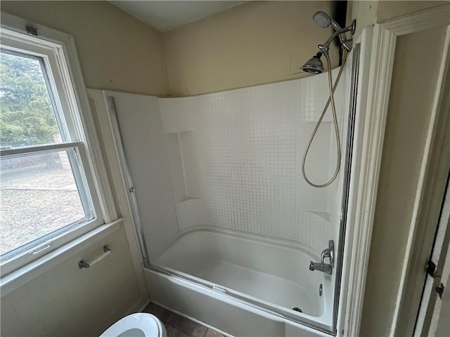 bathroom with  shower combination and toilet