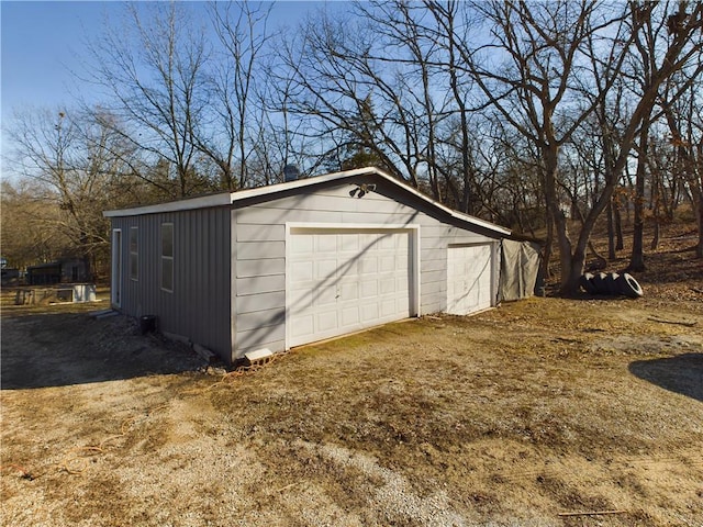 view of outdoor structure with a garage