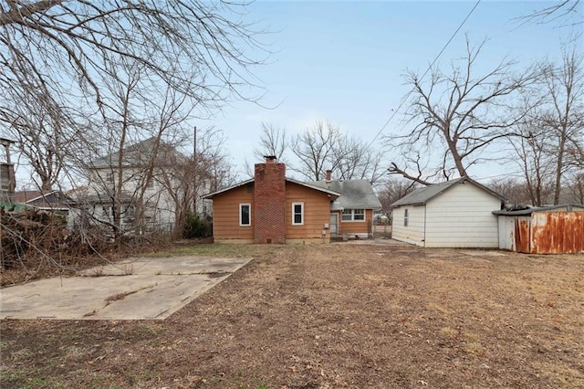 back of house with a patio area