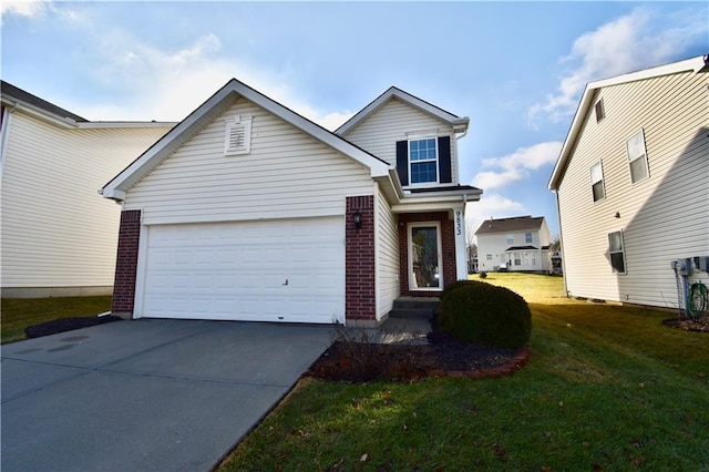 view of property featuring a garage and a front yard