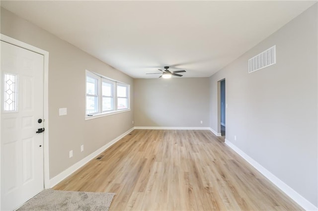 entryway with ceiling fan and light wood-type flooring