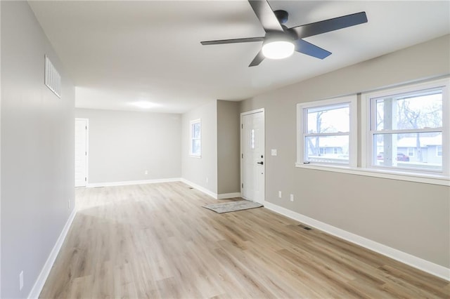 interior space featuring ceiling fan and light wood-type flooring