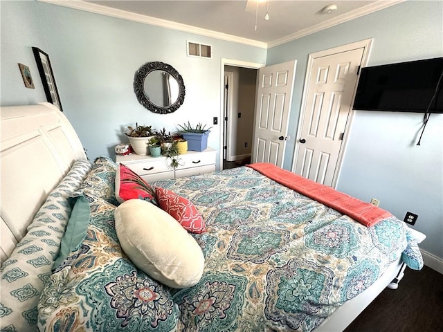 bedroom featuring crown molding