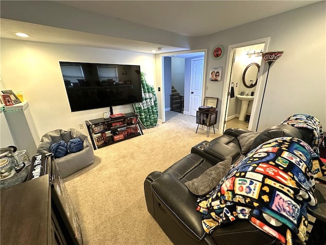 carpeted living room featuring sink