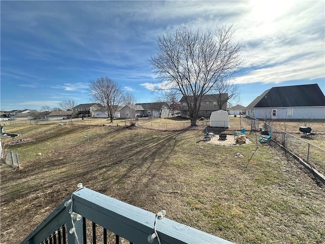 view of yard with a storage shed