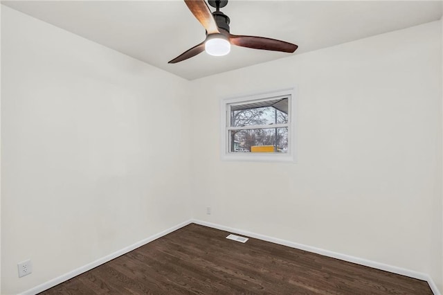 empty room featuring wood-type flooring and ceiling fan