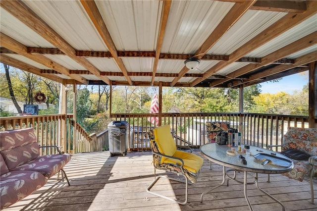 wooden deck with area for grilling