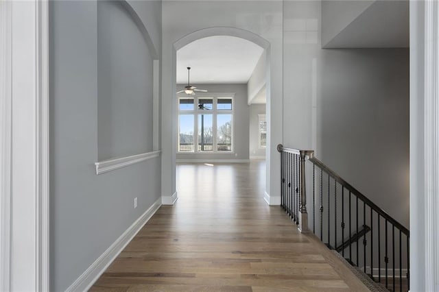 corridor with wood-type flooring