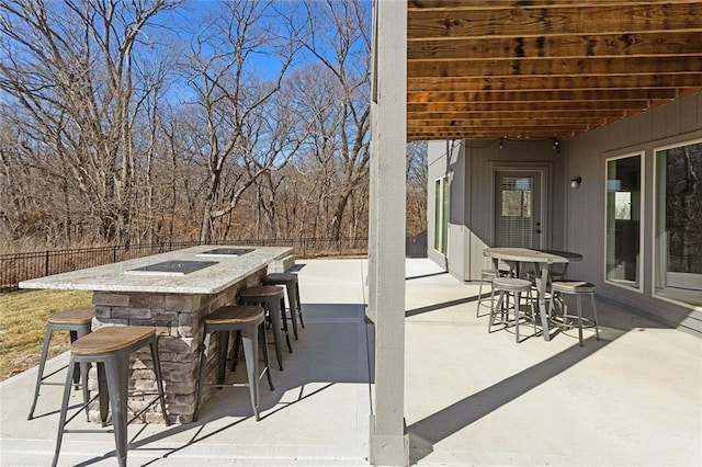 view of patio / terrace with a bar