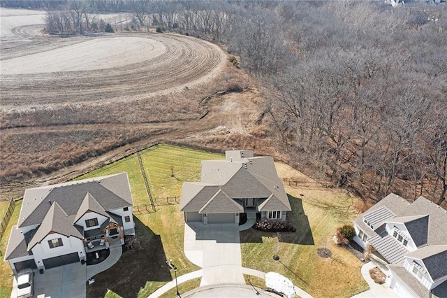 birds eye view of property featuring a rural view