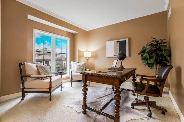 office space with ornamental molding and light colored carpet