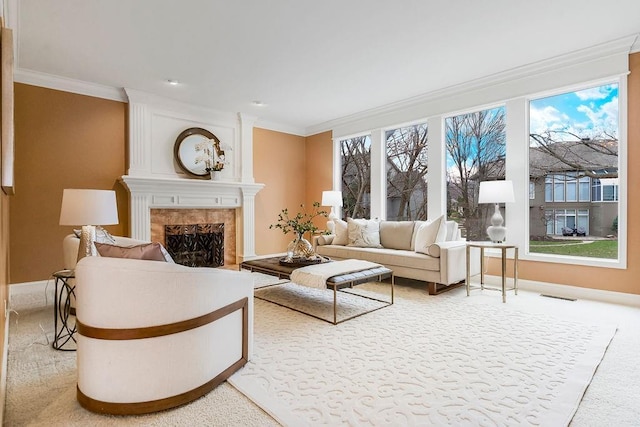 living room with light carpet, crown molding, and a high end fireplace