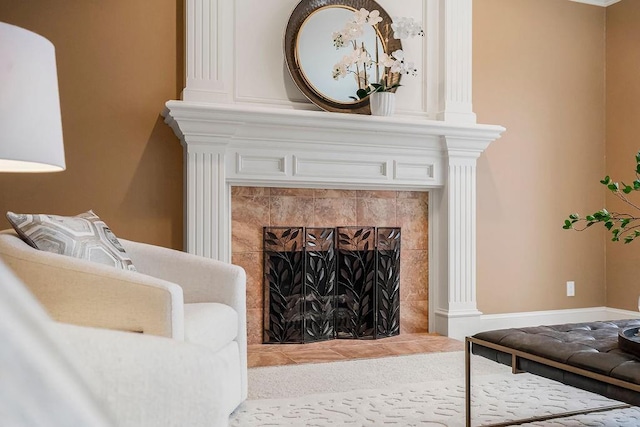 sitting room featuring a premium fireplace