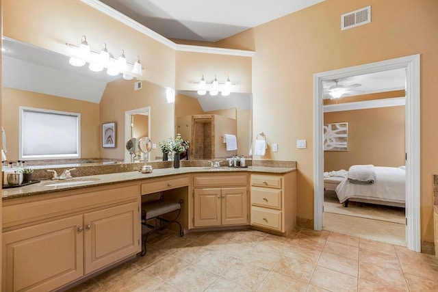 bathroom with vaulted ceiling, a shower with shower door, tile patterned flooring, vanity, and ornamental molding