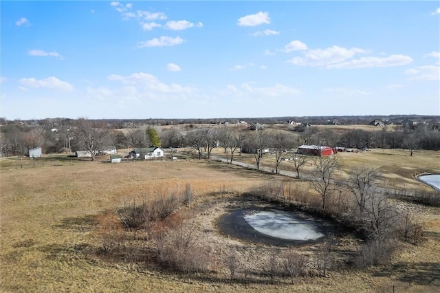 view of yard with a rural view